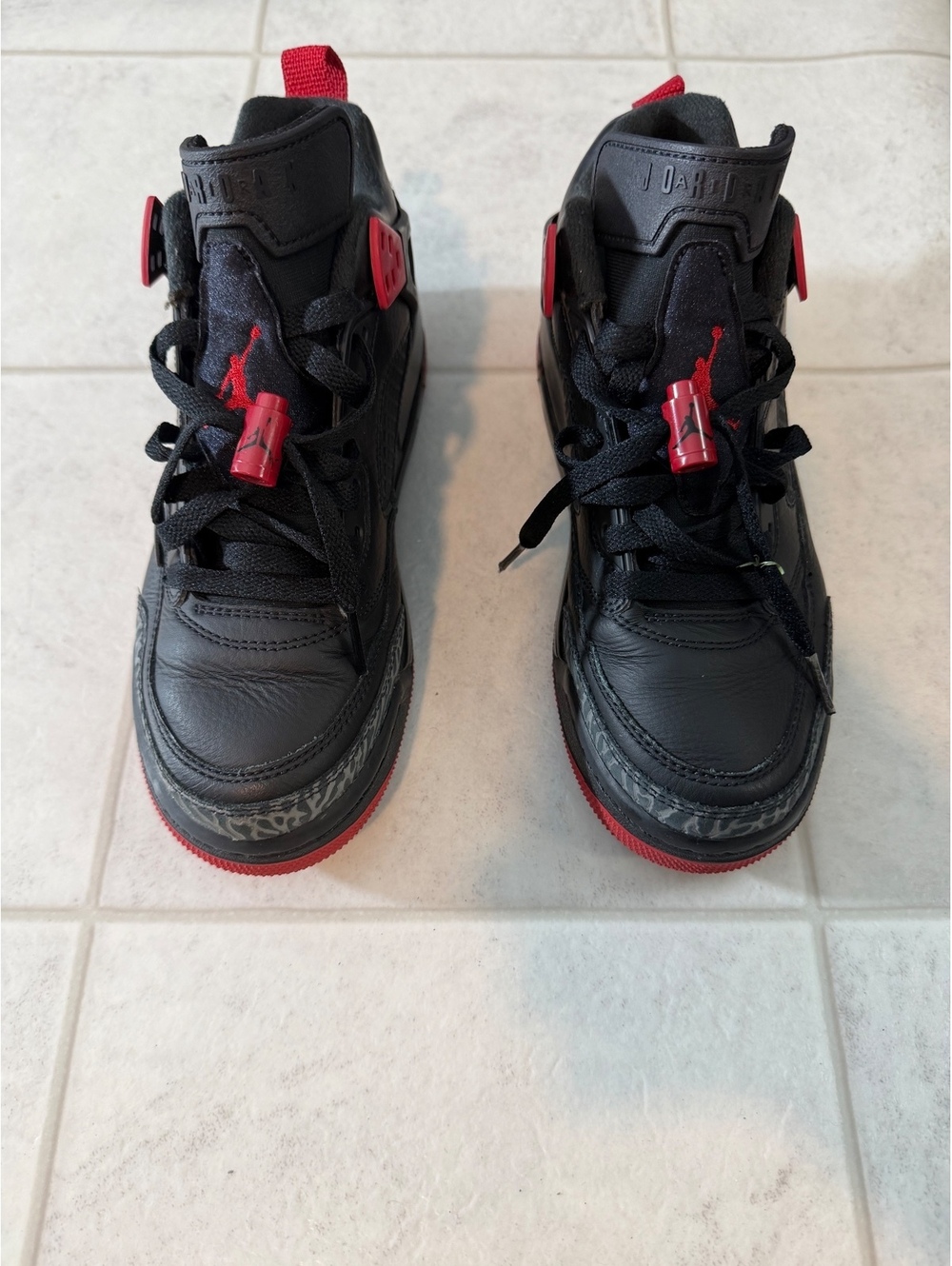 Black and red Jordan basketball shoes